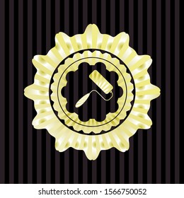 roller brush icon inside gold badge