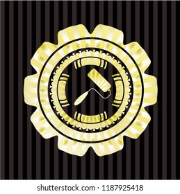 roller brush icon inside golden emblem