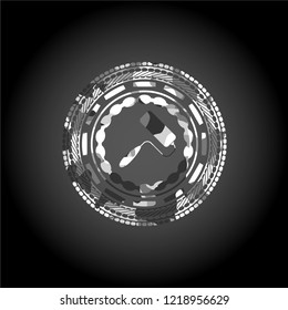 roller brush icon inside grey camouflaged emblem