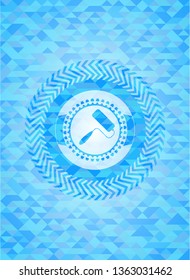 roller brush icon inside light blue emblem with mosaic background