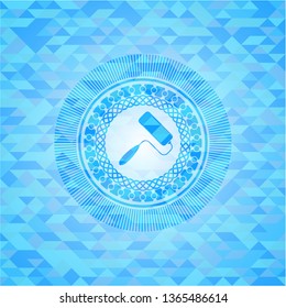 roller brush icon inside light blue emblem with mosaic background
