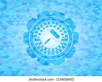 roller brush icon inside realistic sky blue mosaic emblem