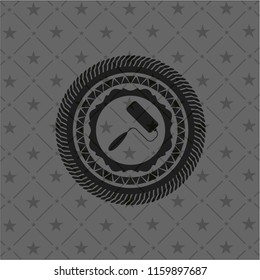 roller brush icon inside realistic black emblem