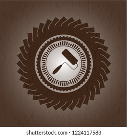 roller brush icon inside realistic wood emblem