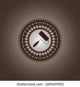 roller brush icon inside realistic wood emblem
