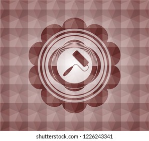 roller brush icon inside red emblem or badge with abstract geometric polygonal pattern background. Seamless.