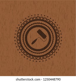 roller brush icon inside retro style wood emblem