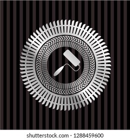 roller brush icon inside silvery shiny badge