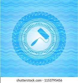 roller brush icon inside sky blue water wave badge background.
