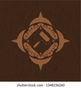 roller brush icon inside vintage wood emblem