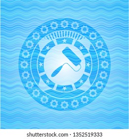 roller brush icon inside water representation emblem.
