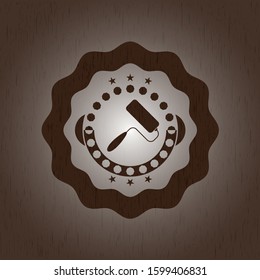 roller brush icon inside wood emblem. Vintage.