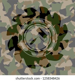 roller brush icon on camo texture