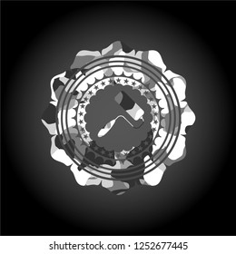 roller brush icon on grey camo pattern
