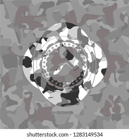 roller brush icon on grey camo texture