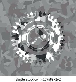 roller brush icon on grey camo pattern