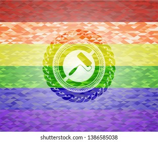 roller brush icon on mosaic background with the colors of the LGBT flag