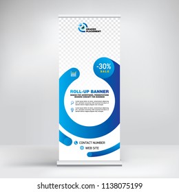 Roll-up design, modern graphic style, banner for advertising goods and services, stand for exhibitions, presentations, conferences, seminars. Abstract blue background for posting photos and text.