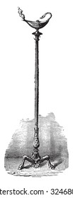 Roman candelabrum with his lamp, vintage engraved illustration. Industrial encyclopedia E.-O. Lami - 1875.
