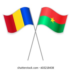 Romanian and Burkinabe crossed flags. Romania combined with Burkina Faso isolated on white. Language learning, international business or travel concept.