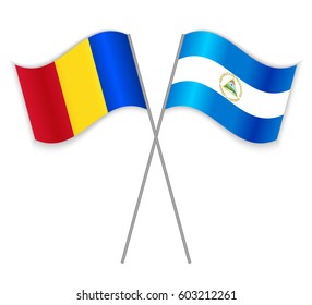 Romanian and Nicaraguan crossed flags. Romania combined with Nicaragua isolated on white. Language learning, international business or travel concept.