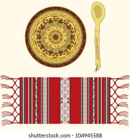 Romanian traditional and folkloric ornamented ceramic plate, wooden spoon and textile serviette