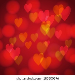 Romantic abstract background with hearts in bokeh effect