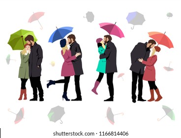 Romantic Autumn. Loving Couples with Umbrellas in the Rain 