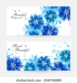 Romantic background with blue cornflowers and paint splashes. Floral design for cosmetics product or wedding invitation. Horizontal flyers with copy space