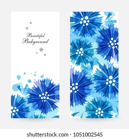 Romantic background with blue cornflowers and paint splashes. Floral design for cosmetics product or wedding invitation. Vertical flyers.