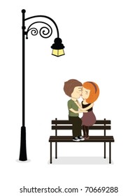 romantic couple kissing under the candelabrum