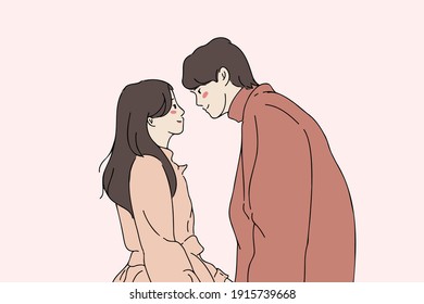 romantic couple in love looking at each other before kissing. Hand-drawn style vector illustration of young couple