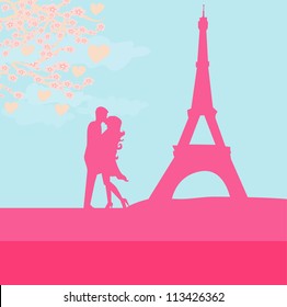  Romantic couple in Paris kissing near the Eiffel Tower