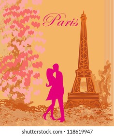  Romantic couple in Paris kissing near the Eiffel Tower