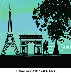  Romantic couple in Paris kissing near the Eiffel Tower