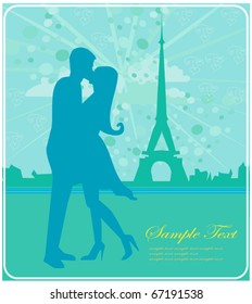 Romantic couple in Paris kissing near the Eiffel Tower. Silhouette