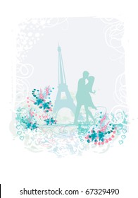 Romantic couple in Paris kissing near the Eiffel Tower. Silhouette