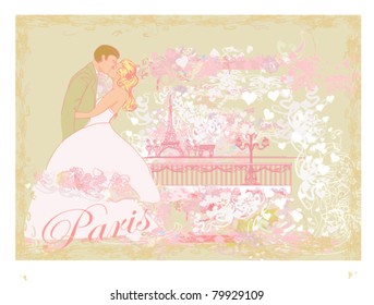 Romantic couple in Paris kissing near the Eiffel Tower. Retro card.