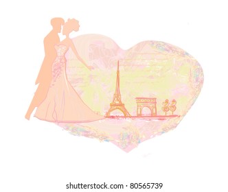 Romantic couple in Paris kissing near the Eiffel Tower. Silhouette