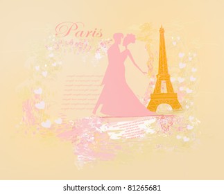 Romantic couple in Paris kissing near the Eiffel Tower. Silhouette