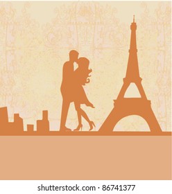 Romantic couple in Paris kissing near the Eiffel Tower. Retro card.