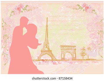 Romantic couple in Paris kissing near the Eiffel Tower. Retro card.