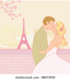 Romantic couple in Paris kissing near the Eiffel Tower. Retro card.