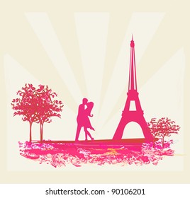 Romantic couple in Paris kissing near the Eiffel Tower. Retro card.