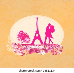 Romantic couple in Paris kissing near the Eiffel Tower. Retro card.