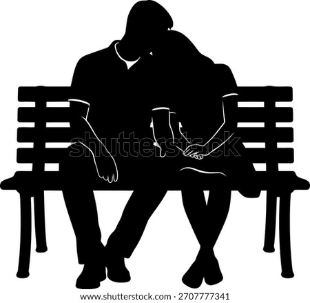 Romantic couple silhouette sitting on a bench, hand in hand.