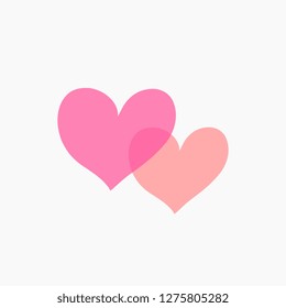 Romantic design with two hearts in pink and peach on white background.