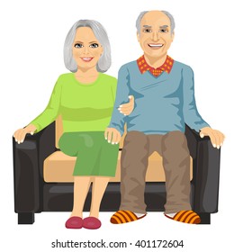 Romantic elderly couple sitting close together on a sofa