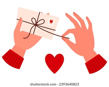 Romantic envelope. Hands opening romantic letter. Letter from a lover. Got a valentine.