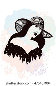 Romantic girl with long hair in a fashionable summer hat on the decorative background.